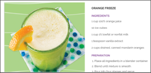 Class full of the healthy drink Orange Freeze with the recipe next to it